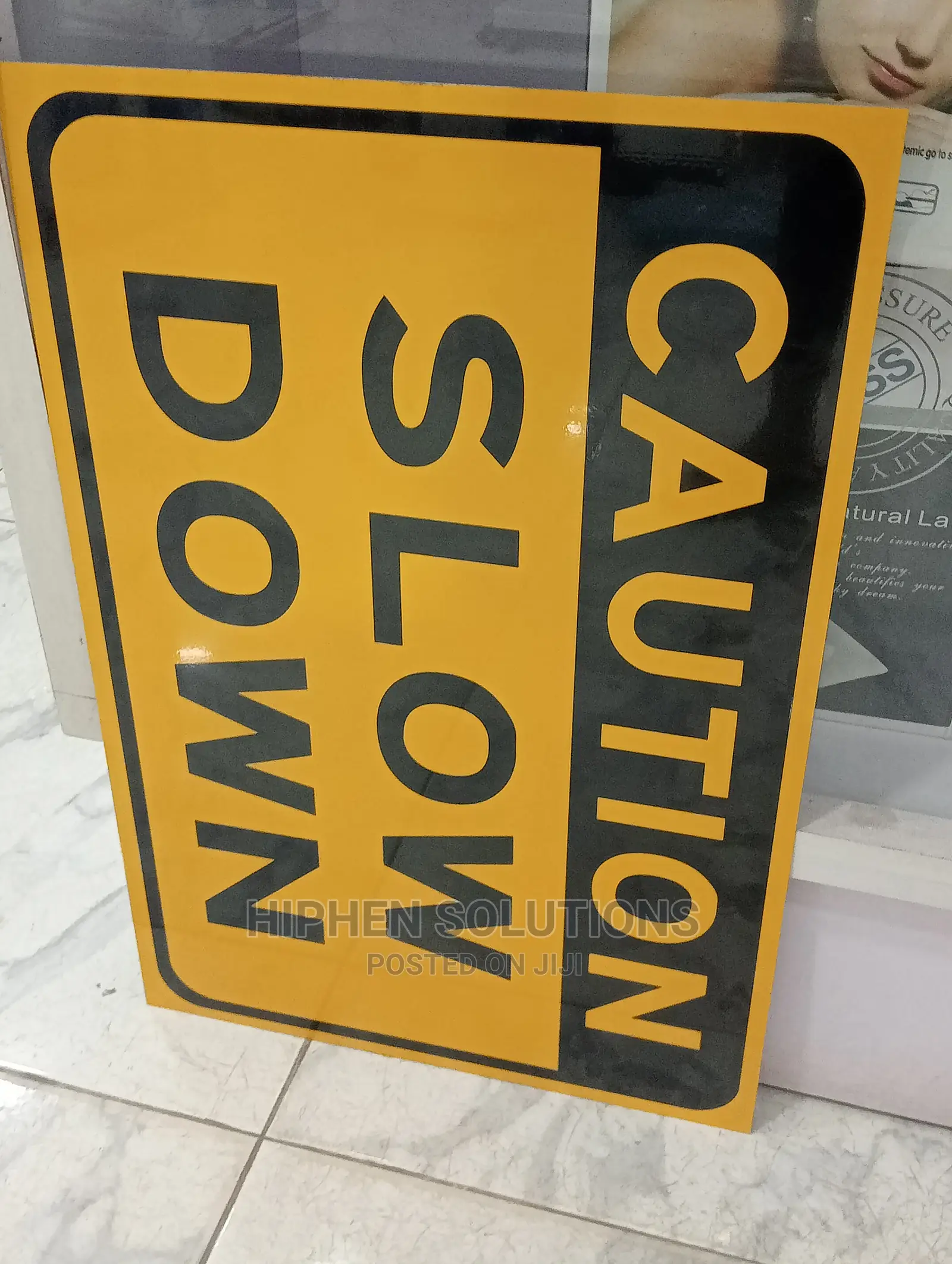 Caution Slow Down Sign