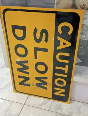 Caution Slow Down Sign