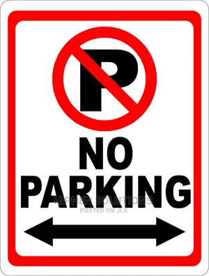 No Parking Sign With Arrow