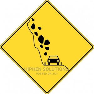 Falling Rocks Ahead Road Sign