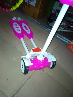 Children Riding Scooters