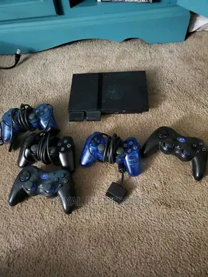Authentic Uk Used Ps2(Slim) With Pes23 + 10 Games And Pad