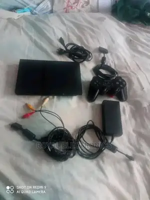 Powerful Uk Used Ps2(Slim)With Pes23+10 Games And Pad