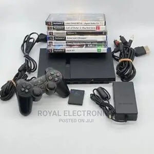 Authentic Uk Used PS2 With Pes23 + 10 Games and Pad