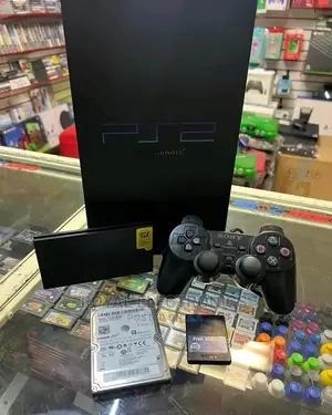 Quality Uk Used Ps2 With Pes23 + 10 Games And Pad