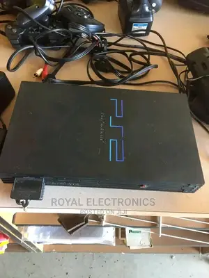 Latest Uk Used Ps2 With Pes23 + 10 Games And Pad