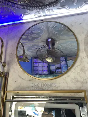 Round Mirror With Black and Gold Frame
