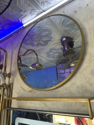 Round Mirror With Black and Gold Frame