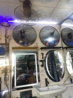 Round Mirror With Black and Gold Frame