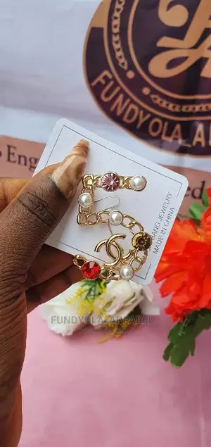 Gold Female Brooch