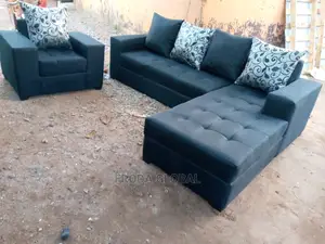 L-Shape Sofa and Single Chair With Pillows. Fabric Couch