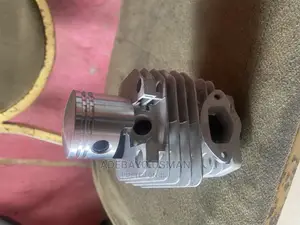 Photo - Medium Chainsaw Machine Engine Block and Piston and Rings