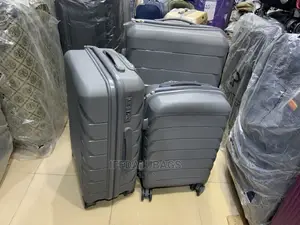 Set of Quality Unbreakable Ash Plastic Traveling Luggage