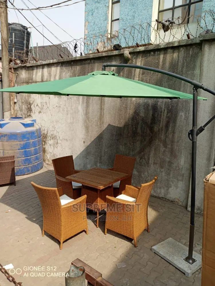 Umbrella, Chairs and Table.