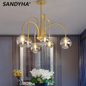 White Ball Bent Iron Spider Molecular Ceiling Lamp.