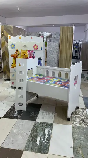 A Quality Baby Cot and Wardrobe