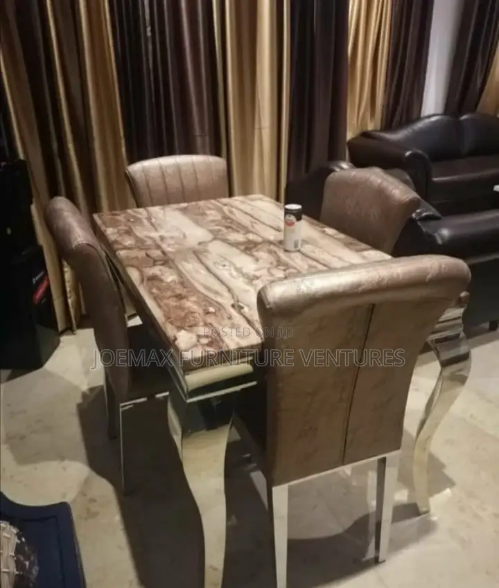 Marble Dining Table by 4 With Four Leather Chairs.