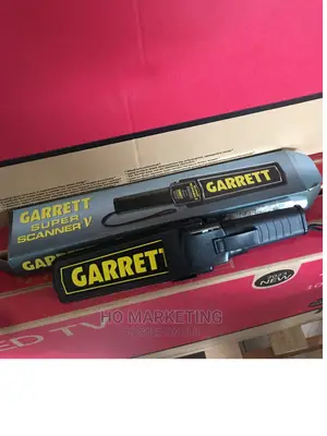 Photo - Fast Detect Hand Held Garrett Metal Detector