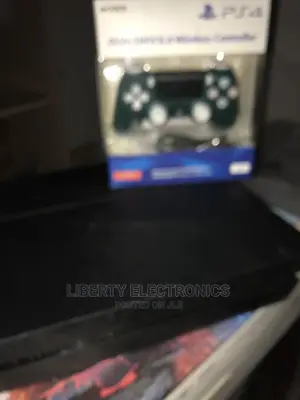 Uk Used Ps4 Regular + 5 Games Preinstalled and 1 Pad,