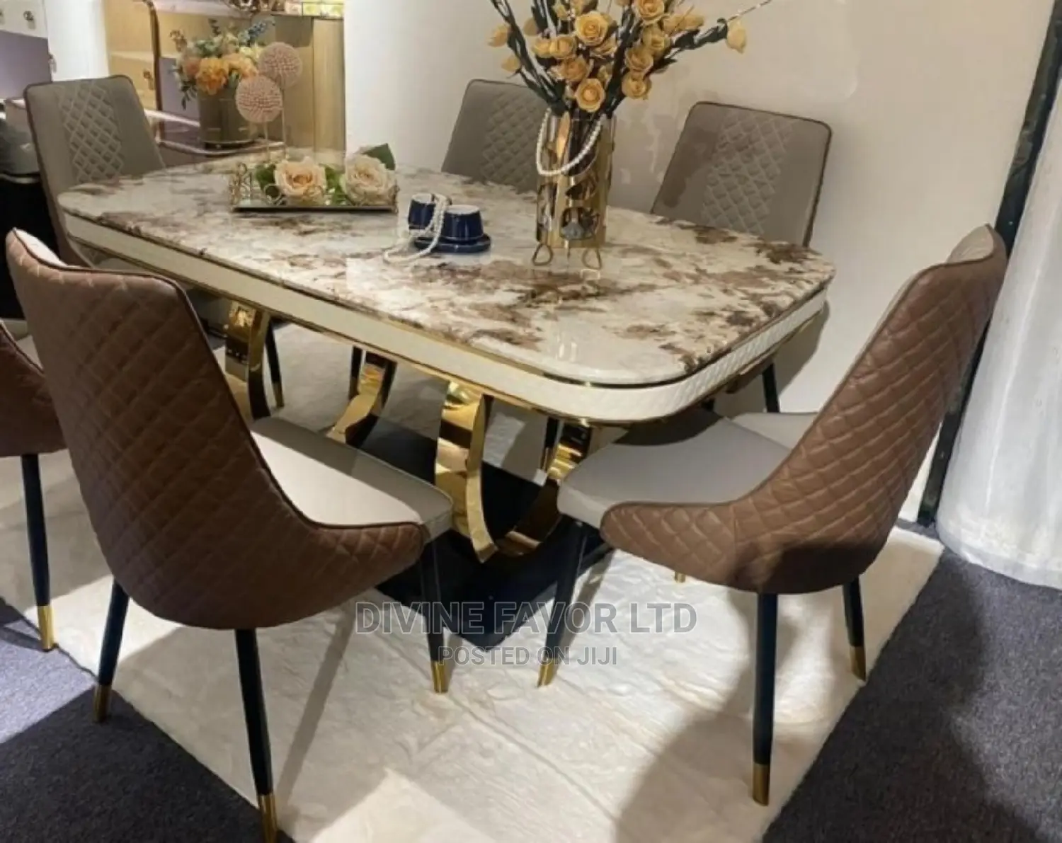 Imported Dining Set With Marble Top Table and Leather Seats.