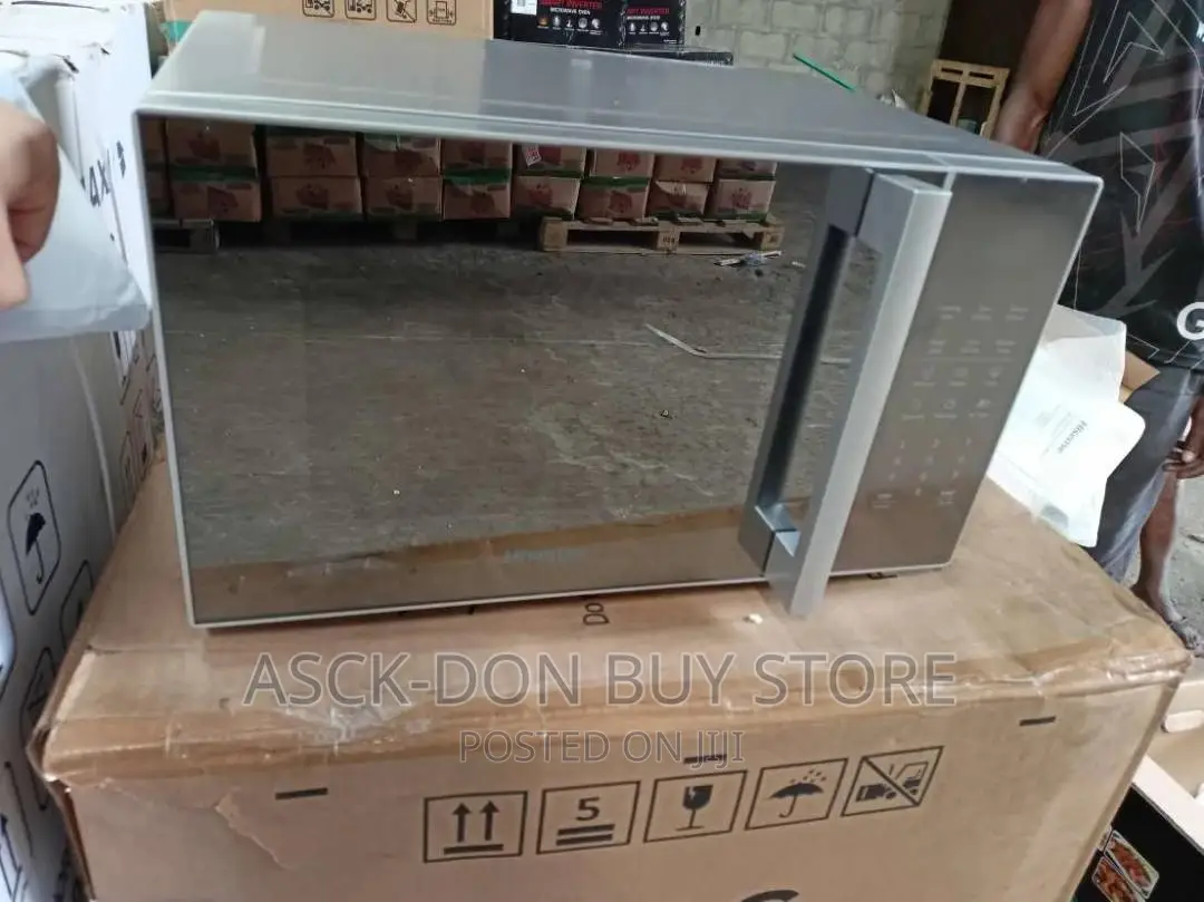 Hisense 25liters Microwave Silver Colour With Handle.