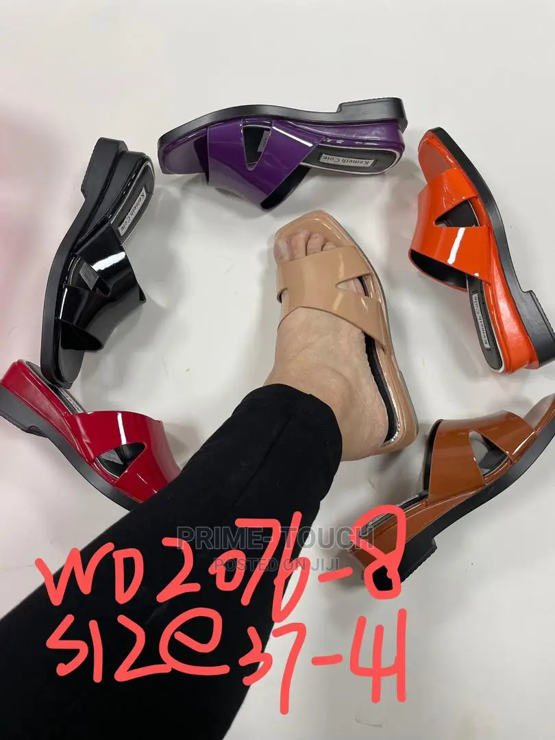 Low Wedge Slippers.
