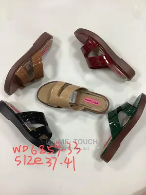 Low Wedge Slippers.