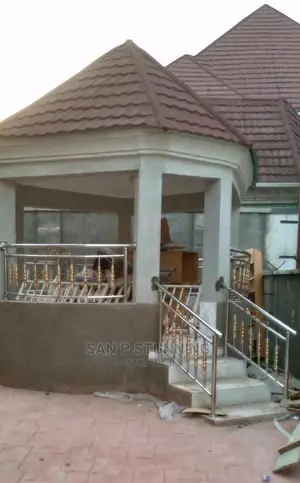Stainless Steel Handrails With Golden Accessories. Top Notch