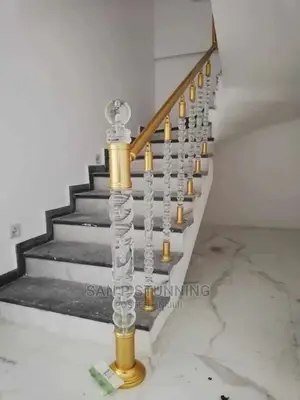 Golden Hand Rails With Lovely Crystal Designs.