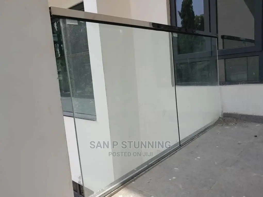 Executive Glass Railing With Frameless Design.