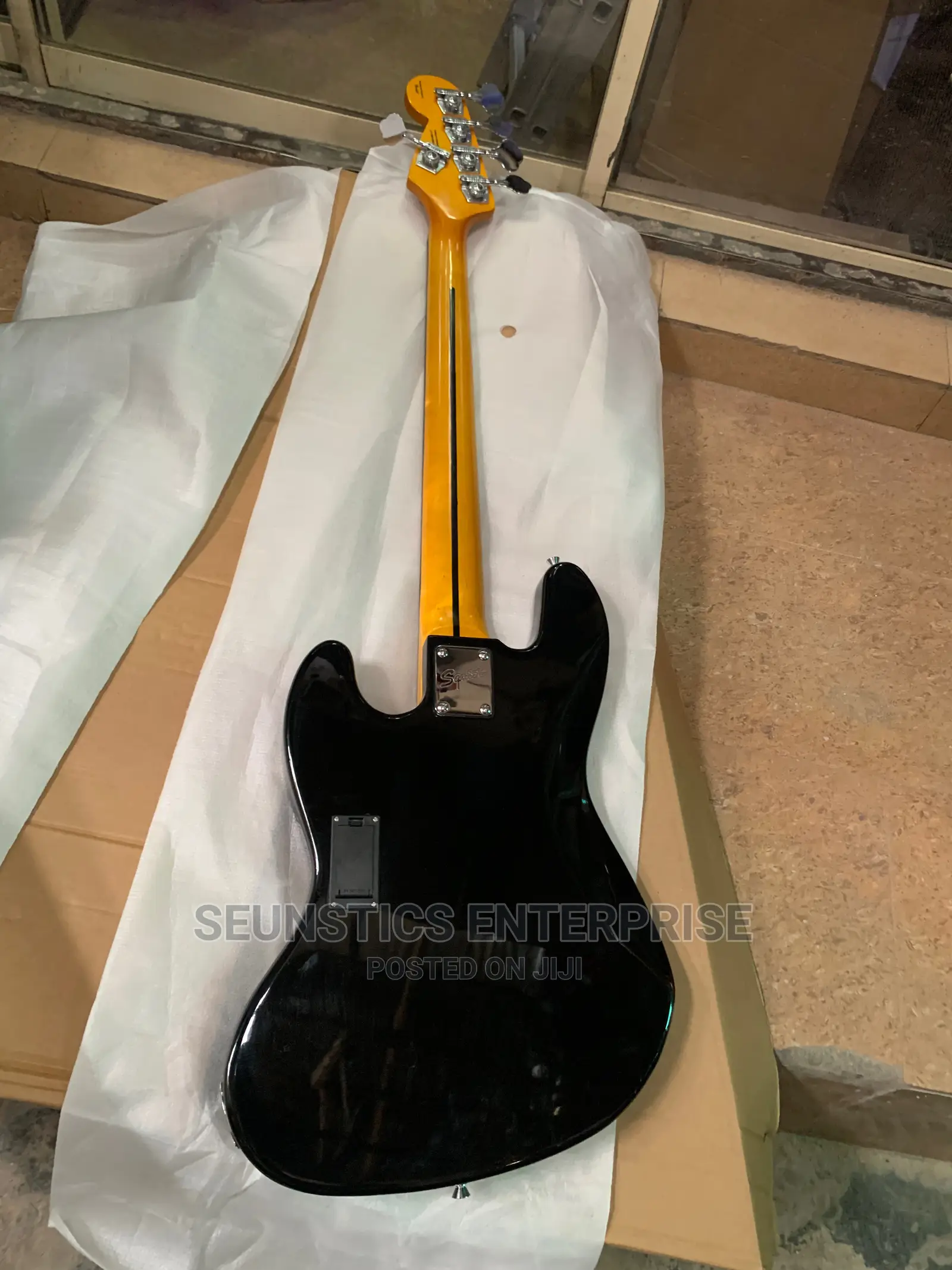 Good Squier by Fender Active Five String Jazz Guitar