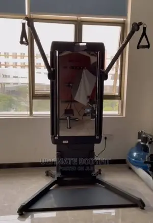 Dual Cable Crossover Trainer, Adjustable Arms Description