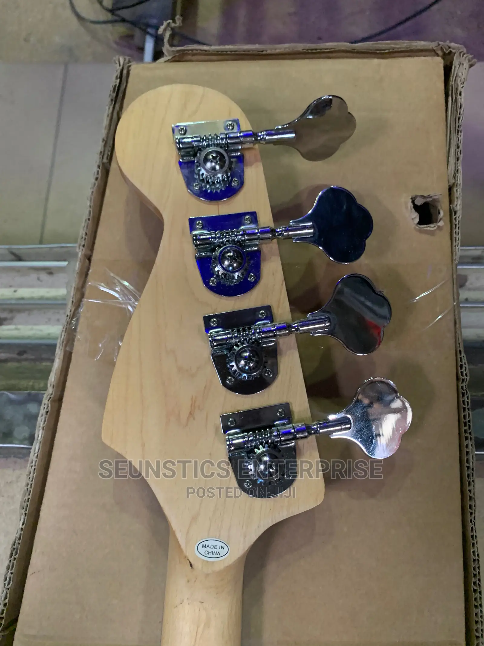 Quality Photogenic Four String Passive Bass Guitar