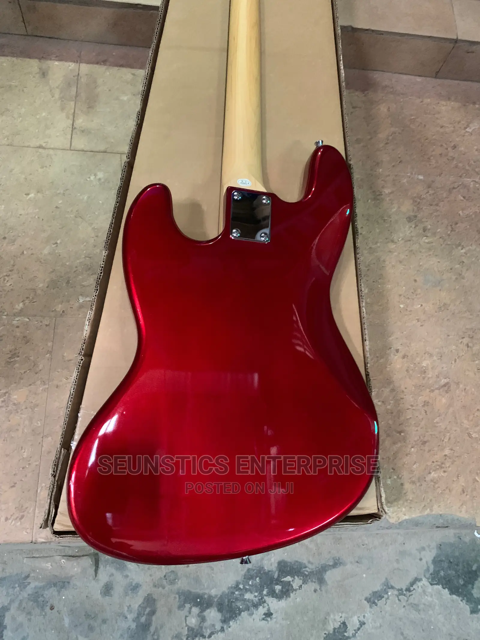 Quality Photogenic Four String Passive Bass Guitar