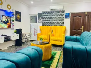 A Standard Living Room Sofa With Center Table