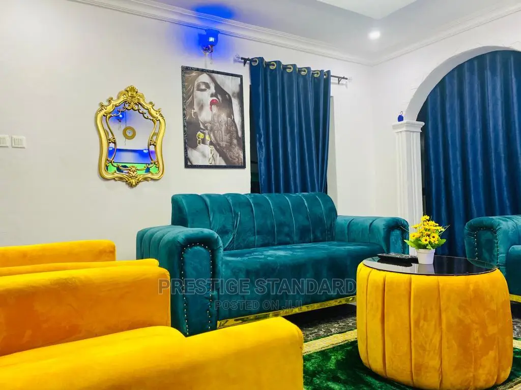 A Standard Living Room Sofa With Center Table