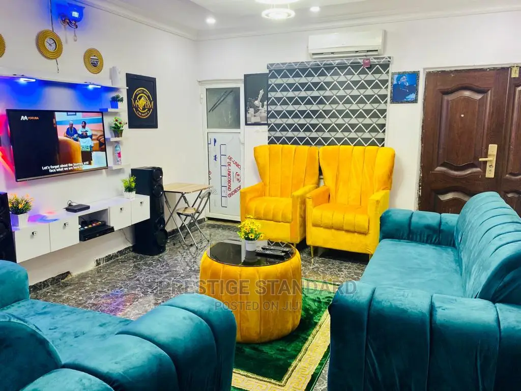 A Standard Living Room Sofa With Center Table