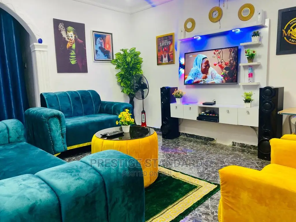 A Standard Living Room Sofa With Center Table