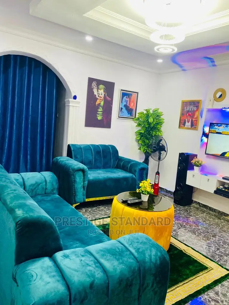 A Standard Living Room Sofa With Center Table