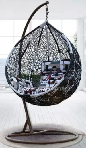 Photo - Quality Indoor/Outdoor Rattan Made Hanging Swing Chair.