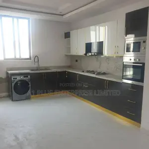 Dark Grey and White Kitchen With a Touch of Gold