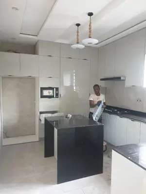 Gray Full Height Kitchencabinet With Black Galaxy Marble Top