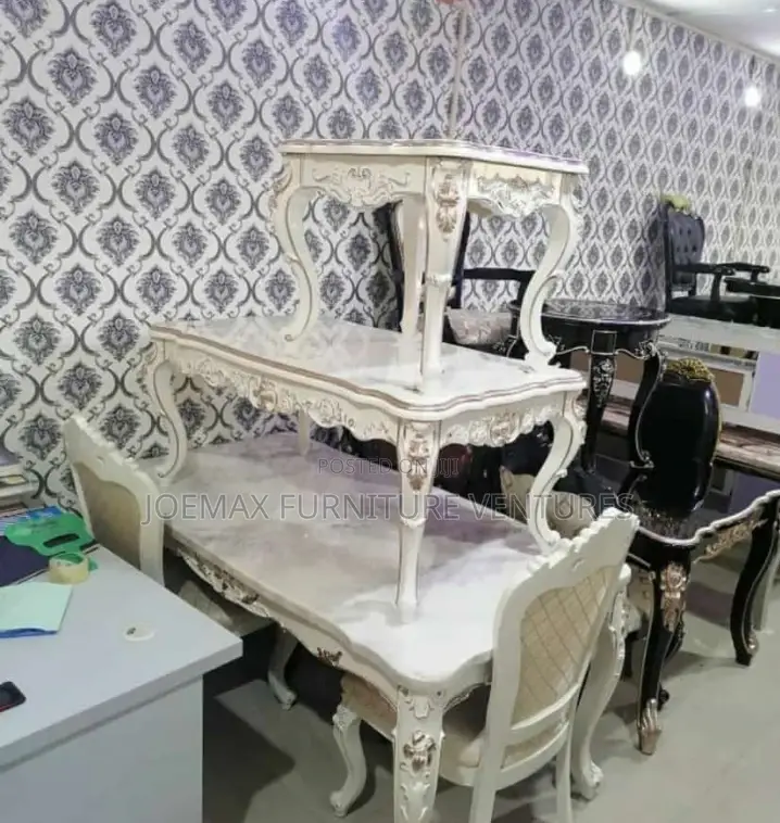 Complete Royal Dining Set With Center Table and 2 Stools.