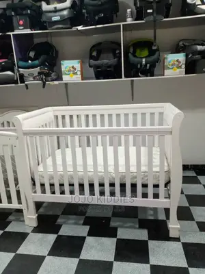 US Used Like New Wooden Baby and Toddler Bed
