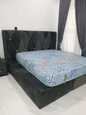 Grey 6 X 6 Fabric Bed With a Touch of Gold One Bedside
