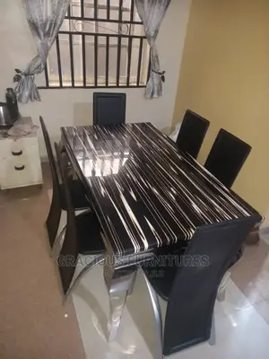 Quality Dining Table by 6 Chairs