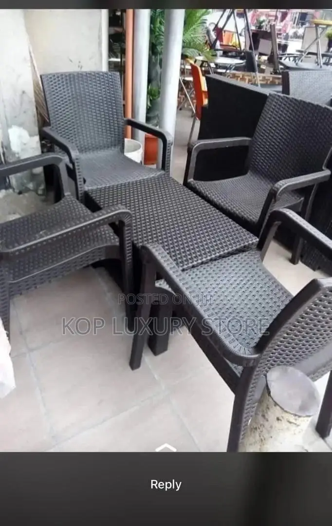 A Set of Four Chairs and Table