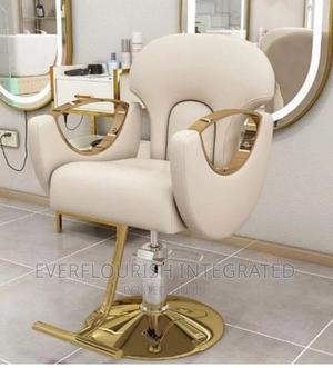 Barbing Salon/Hairdressing Chair With Gold Footrest.