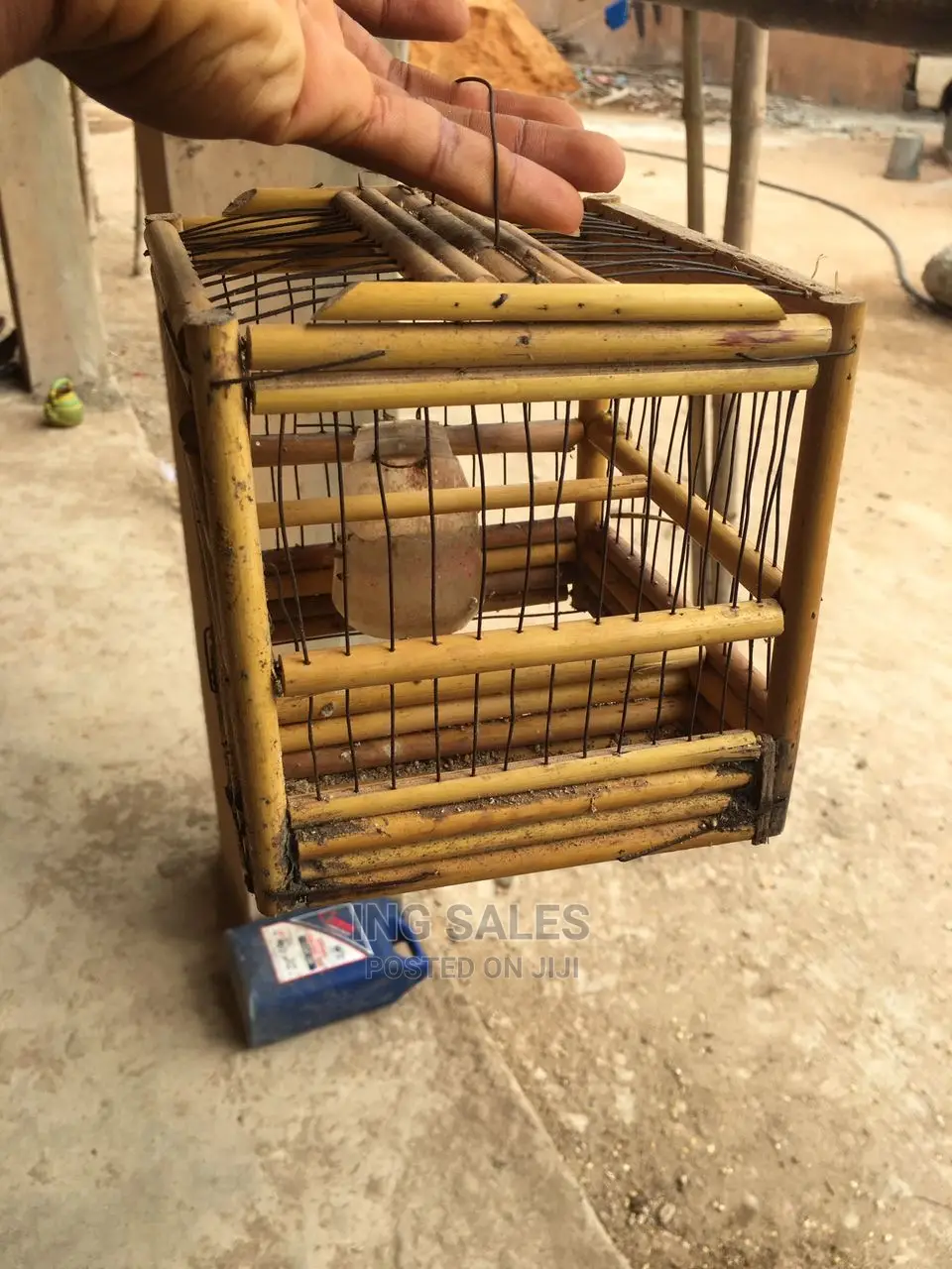 One Yellow/Black Canery Bird With Small Wooden Cage + Feed in Surulere