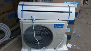 Brand New Media 1.5 Hp Air Conditioner With Warranty Sign